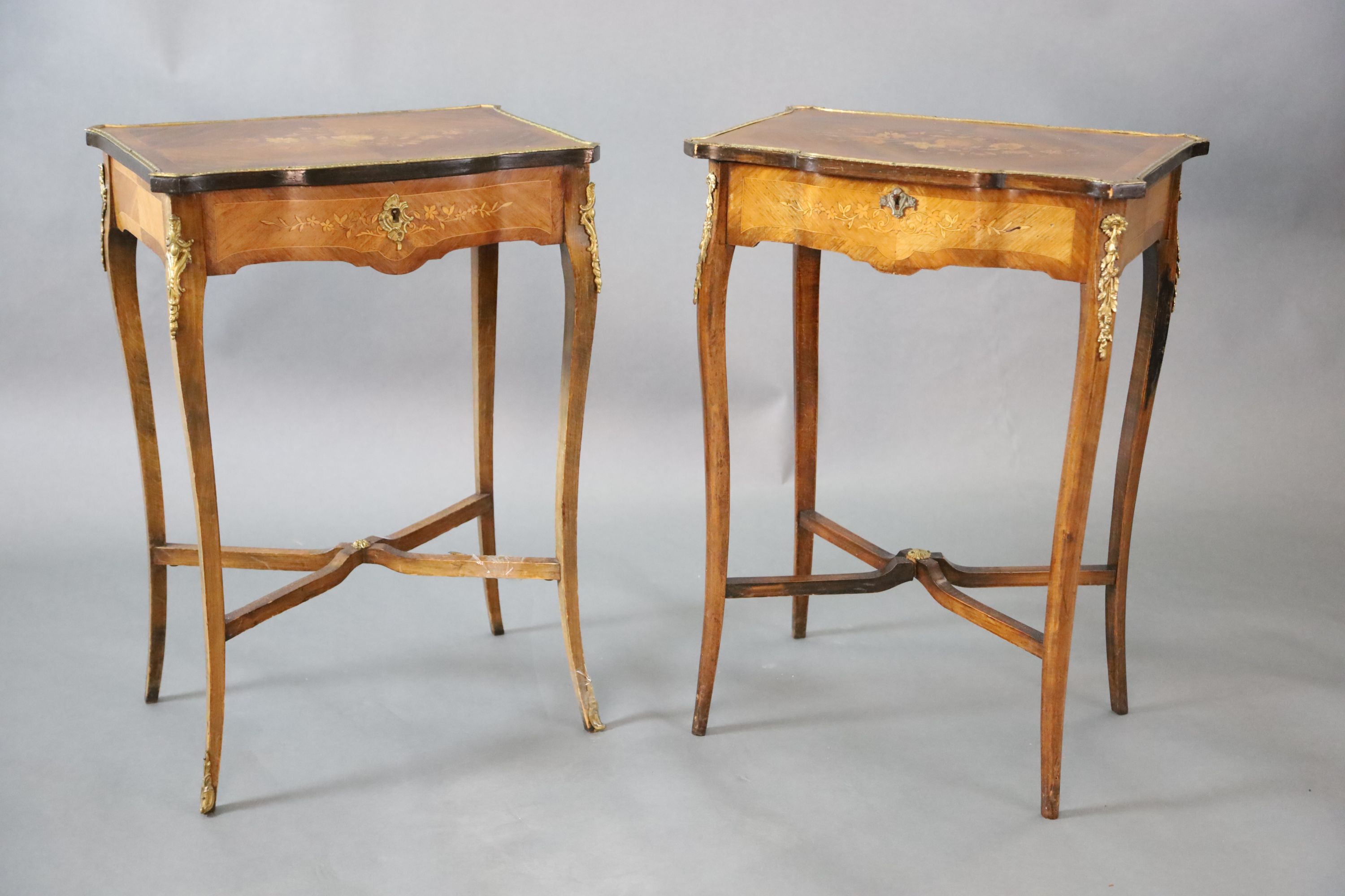 A pair of Louis XVI style ormolu mounted marquetry work tables, W.1ft 9in. D.1ft 3in. H.2ft 6in.